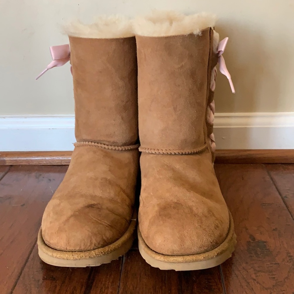 Girls UGG boots with pink lace on side